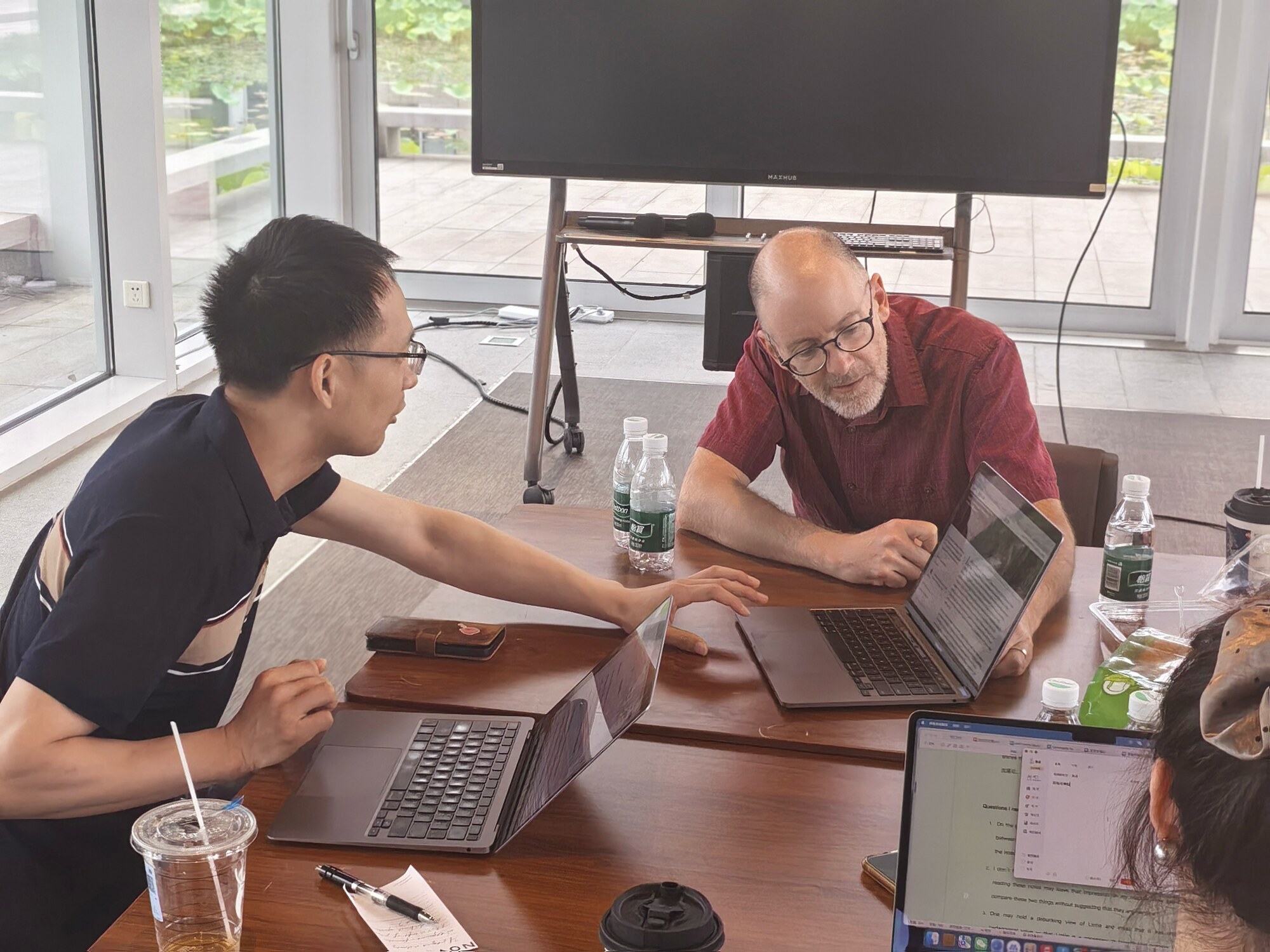 Participants working together on a draft