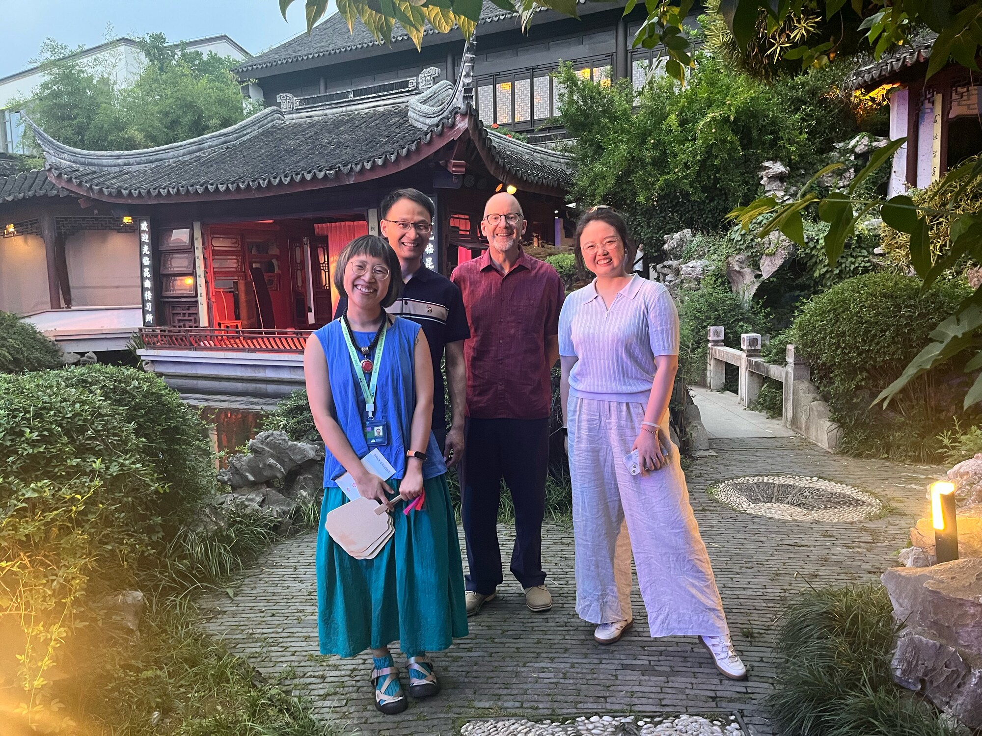Workshop participants in a classical Chinese garden
